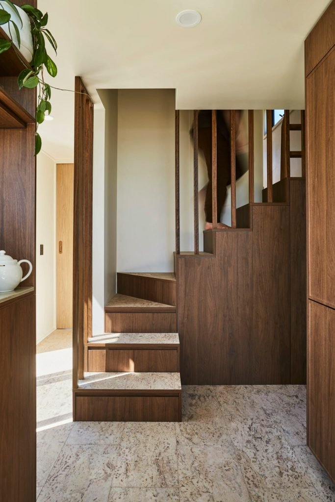 modern-wooden-staircase-in-a-well-lit-interior-space-bysy-ye1jlq